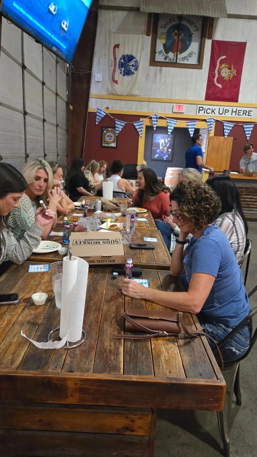 Guests enjoying Plant Bingo at Suds Monkey