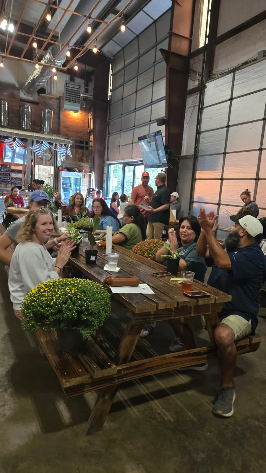 Guests enjoying Plant Bingo at Suds Monkey